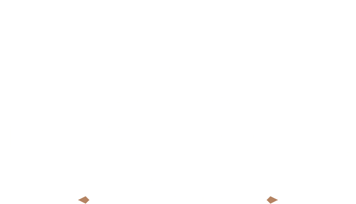 White silhouette of a rearing horse above the words Iron Horse Vineyards, Established 1976 on a light background.