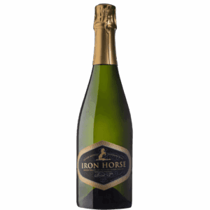 A bottle of Iron Horse sparkling wine with a gold foil top and a black and gold label.