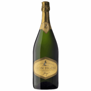 A bottle of Iron Horse sparkling wine with a gold label and foil on a light background.