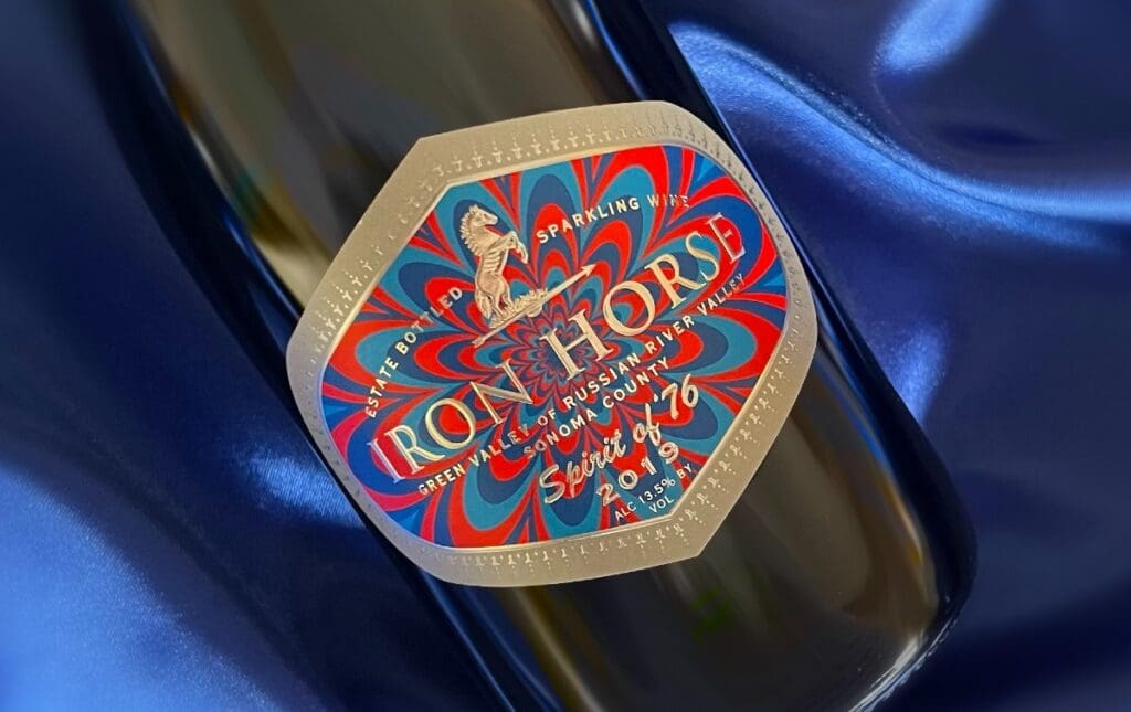 spirit of 76 bottle image on a blue background