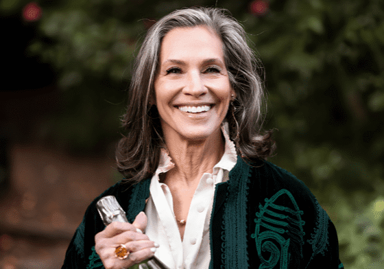 Iron Horse's Joy Sterling with bottle in hand