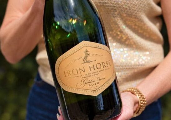 A bottle of Golden Cuvee in hands
