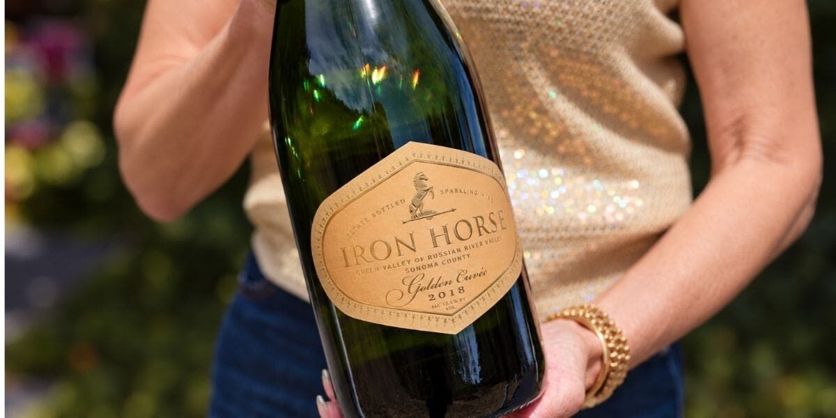 A bottle of Golden Cuvee in hands