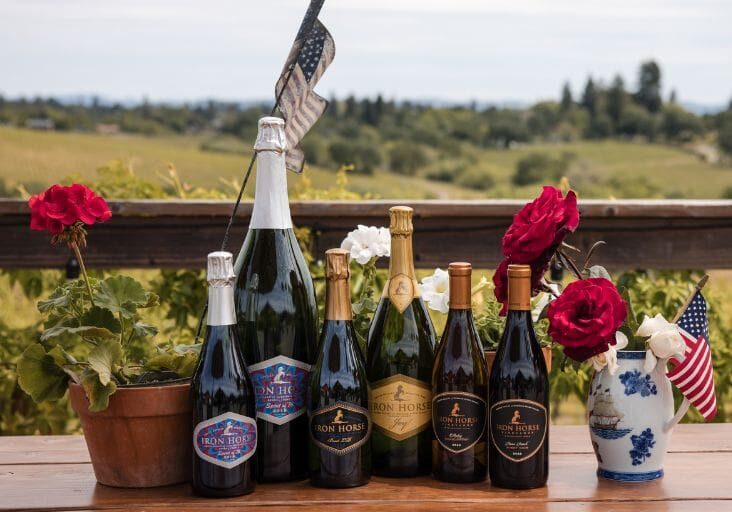 6 wines lined up on a table to celebrate the july 4 wine tasting